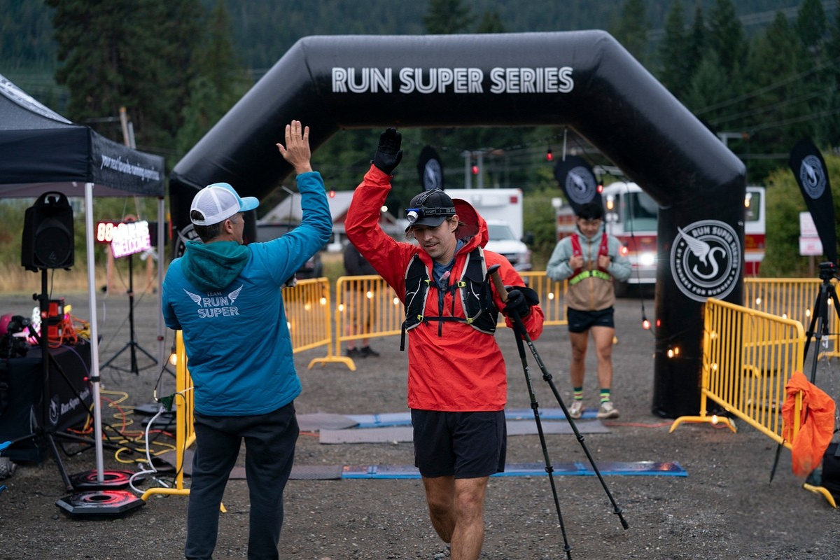 Runner finishing Ultra Fest 100 Mile ultramarathon race in Easton Washington among the Cascades