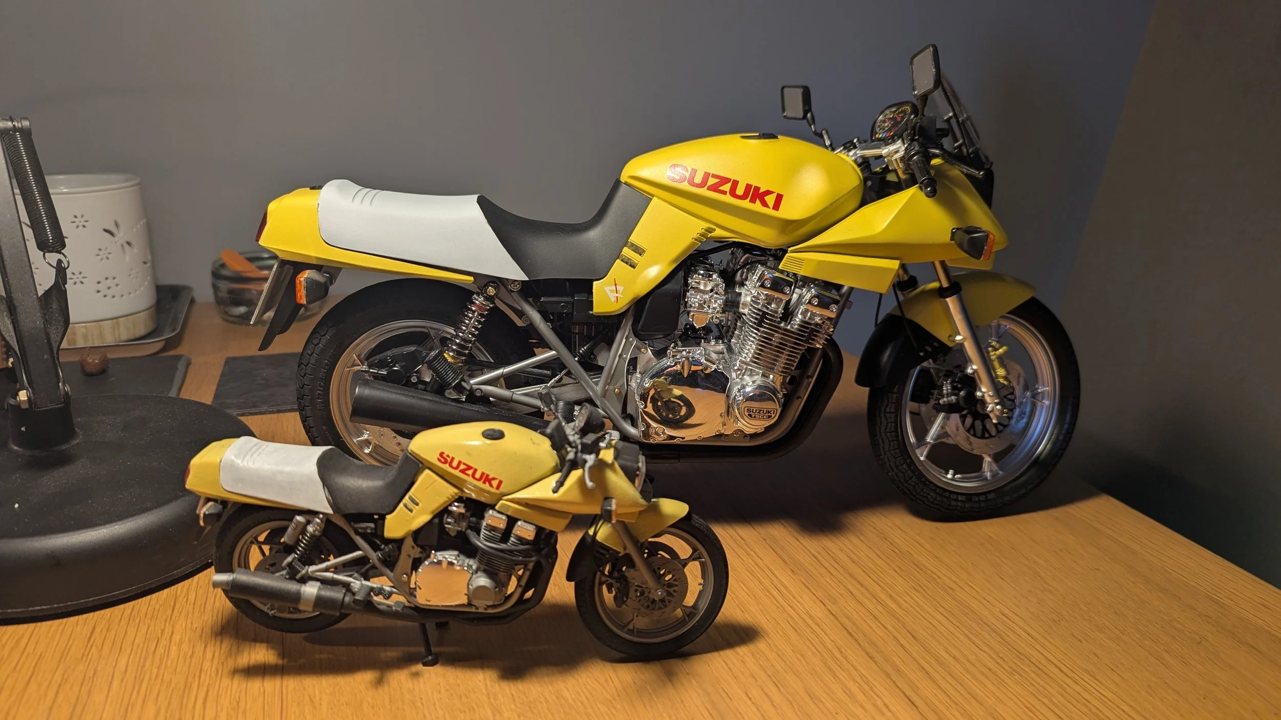 Two yellow motorcycle models painted in "Banana Katana" colours.