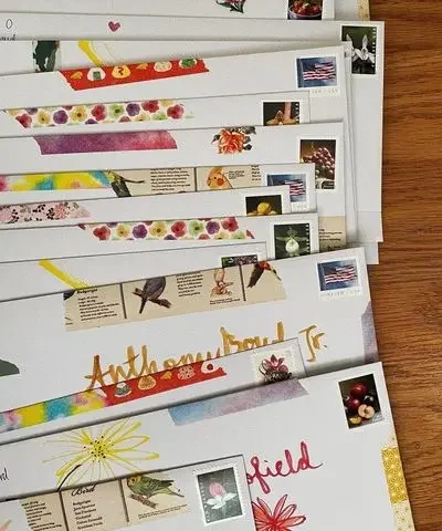 Letters covered with stickers and art