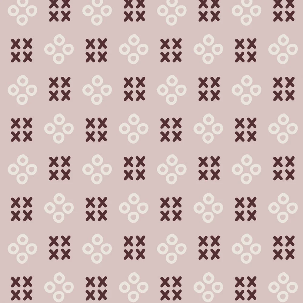Pattern No 09d - Checkerboard-style pattern using x and o shapes in sucre and cumin on pink salt.