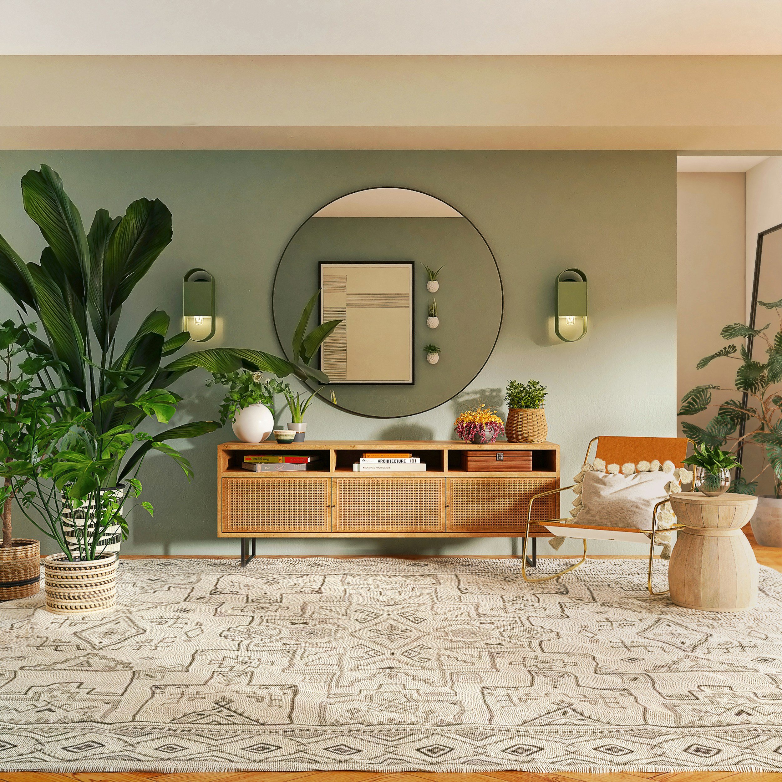 Living room with green accent wall, decorative mirror, and plants. Includes wooden sideboard with books, vases, and flowers, and a patterned rug.