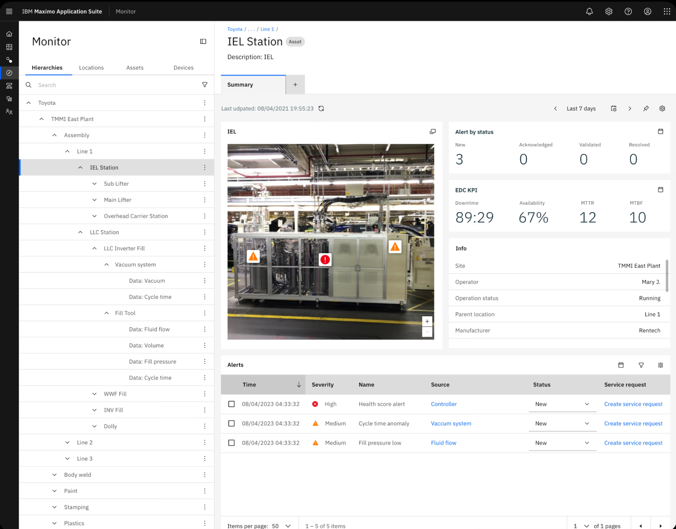 Industrial monitor displaying a machine with warning and alert icons in a factory setting.