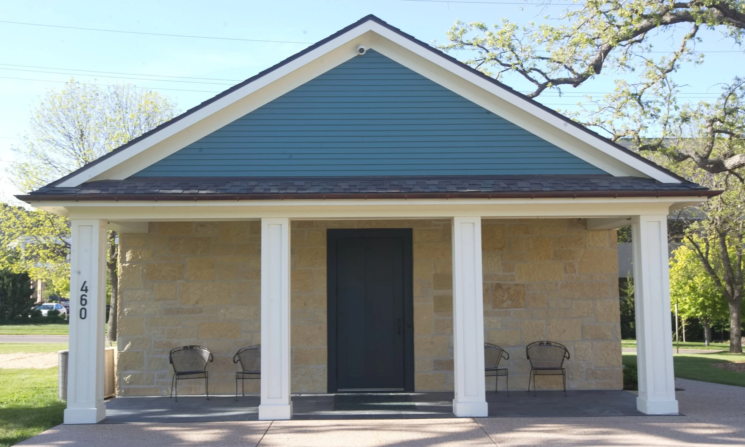 Front porch of the an 1840s Greek Revival building.