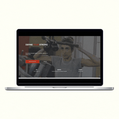 Laptop displaying a fitness website featuring a young woman lifting weights.