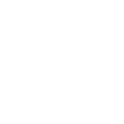 White paper airplane with a dotted trail on a black background.