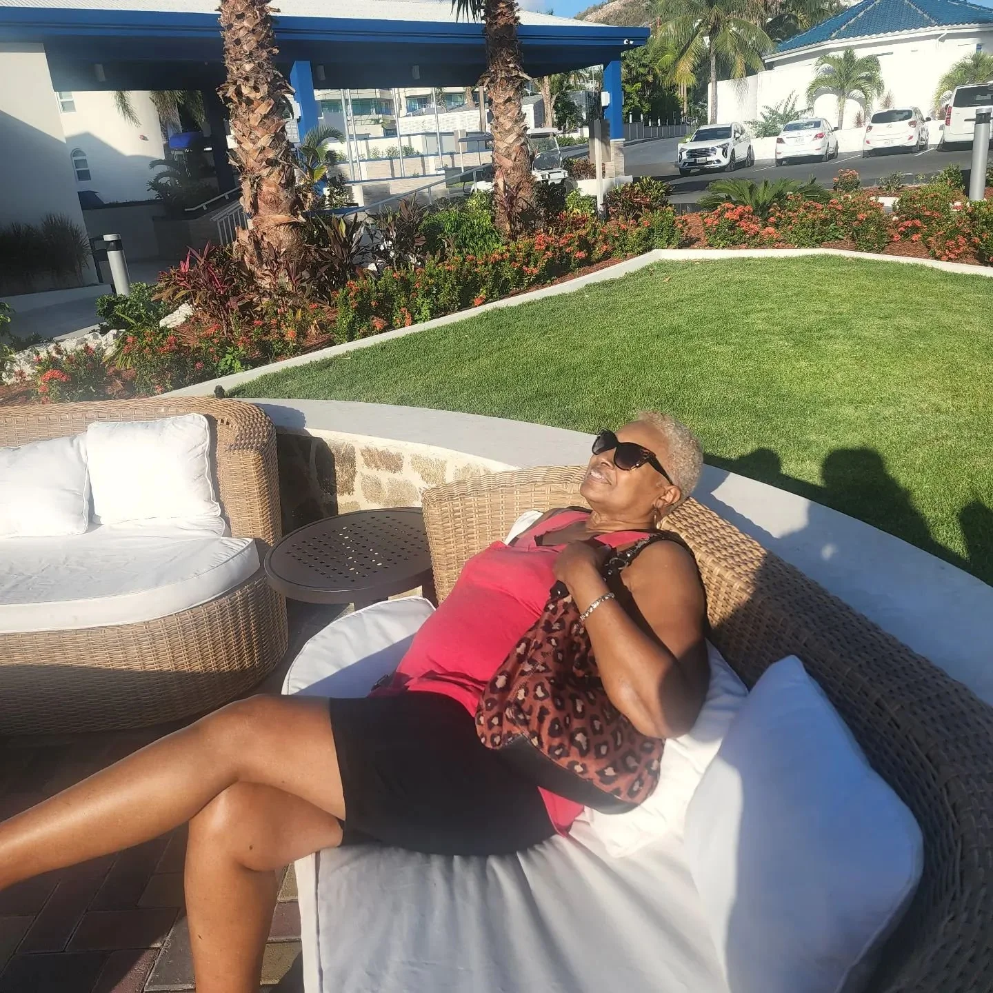 Erica's mother relaxing in the sunshine while traveling