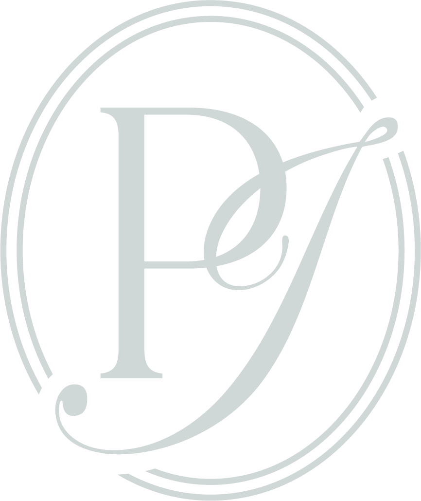 Stylized letter logo with a large 'P' and a smaller 'J', outlined with double concentric circles, on a black background.