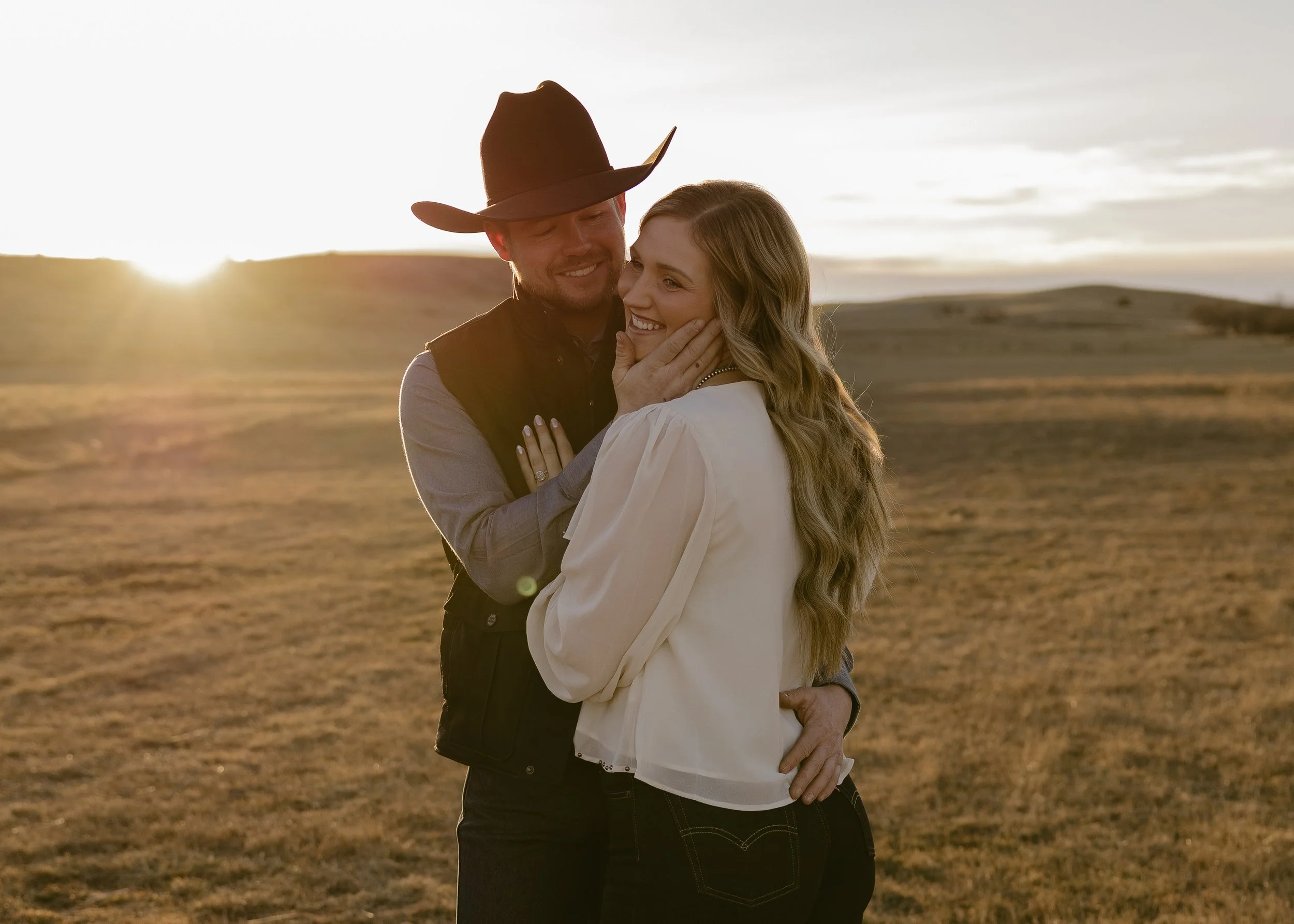 Couple smiling together during South Dakota couples session