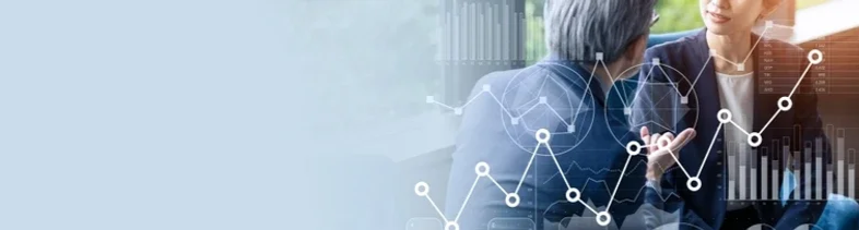 Two professionals having a discussion, with digital graphs and charts overlayed on the image.