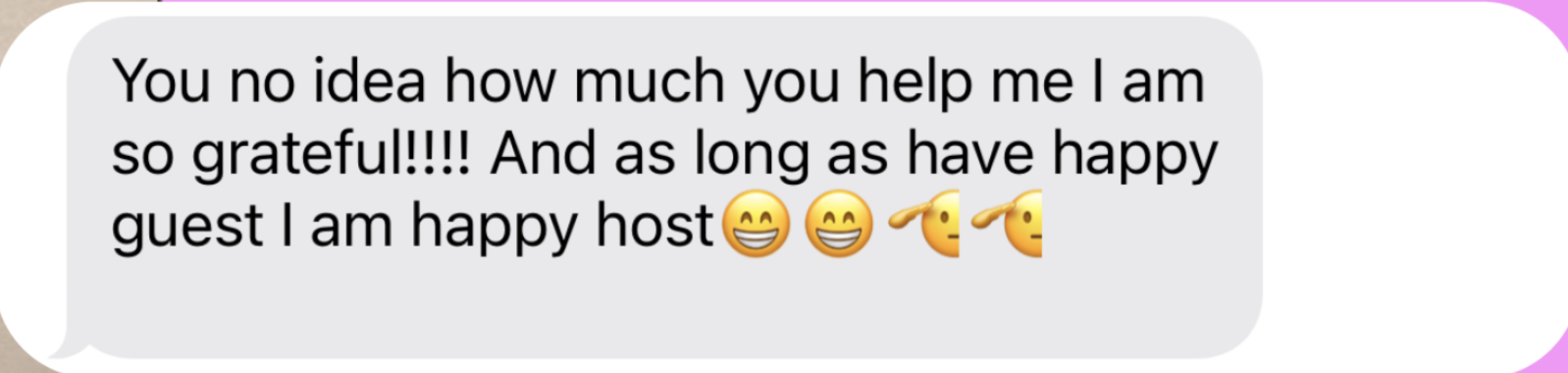 A screenshot of a text message expressing gratitude and happiness, with smiling and blushing face emojis.