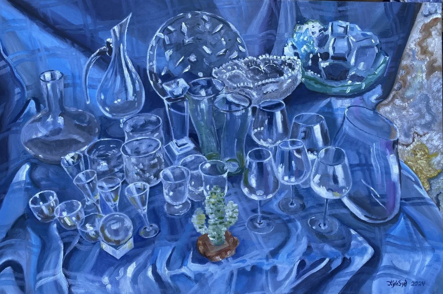 Painting of a table covered with a blue cloth, displaying various glassware including vases, bowls, and glasses, with decorative dishes and a small potted plant in the center.