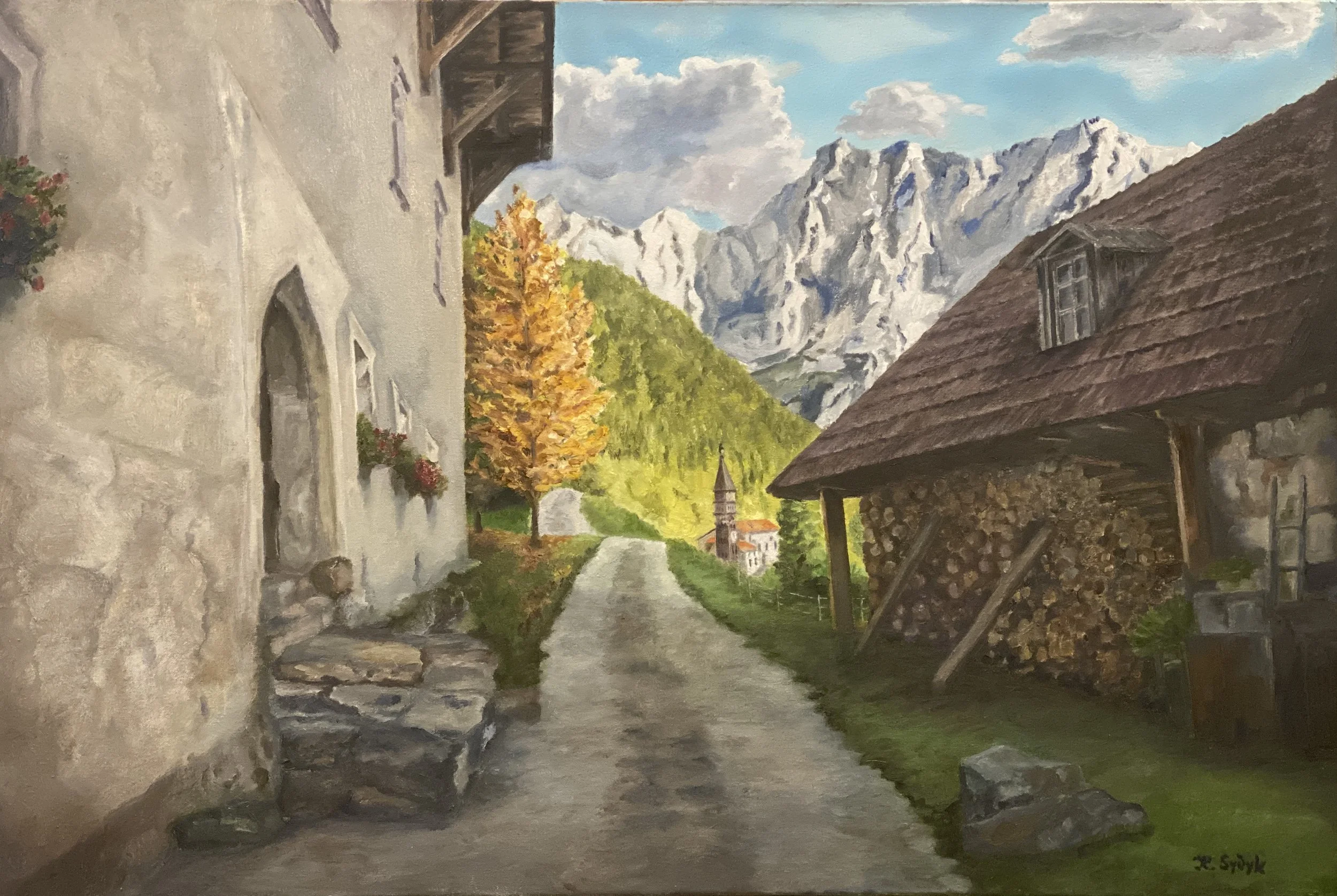 A scenic painting of a mountain village with stone and wooden houses, autumn leaves on a tree, a church tower in the distance, and snow-capped mountains under a partly cloudy sky.