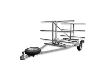 Empty boat trailer with multiple horizontal support beams and a spare tire mounted at the front.