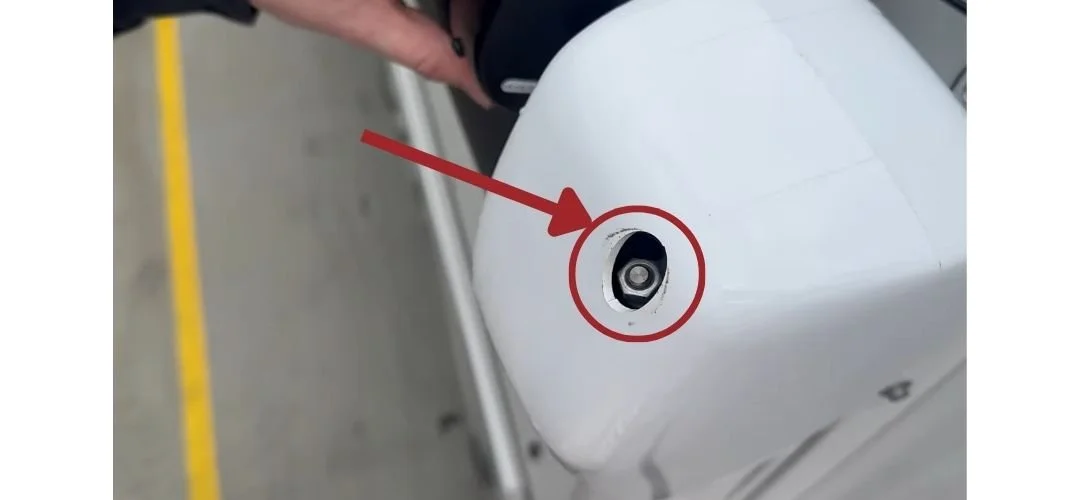 Where to manually retract an RV awning