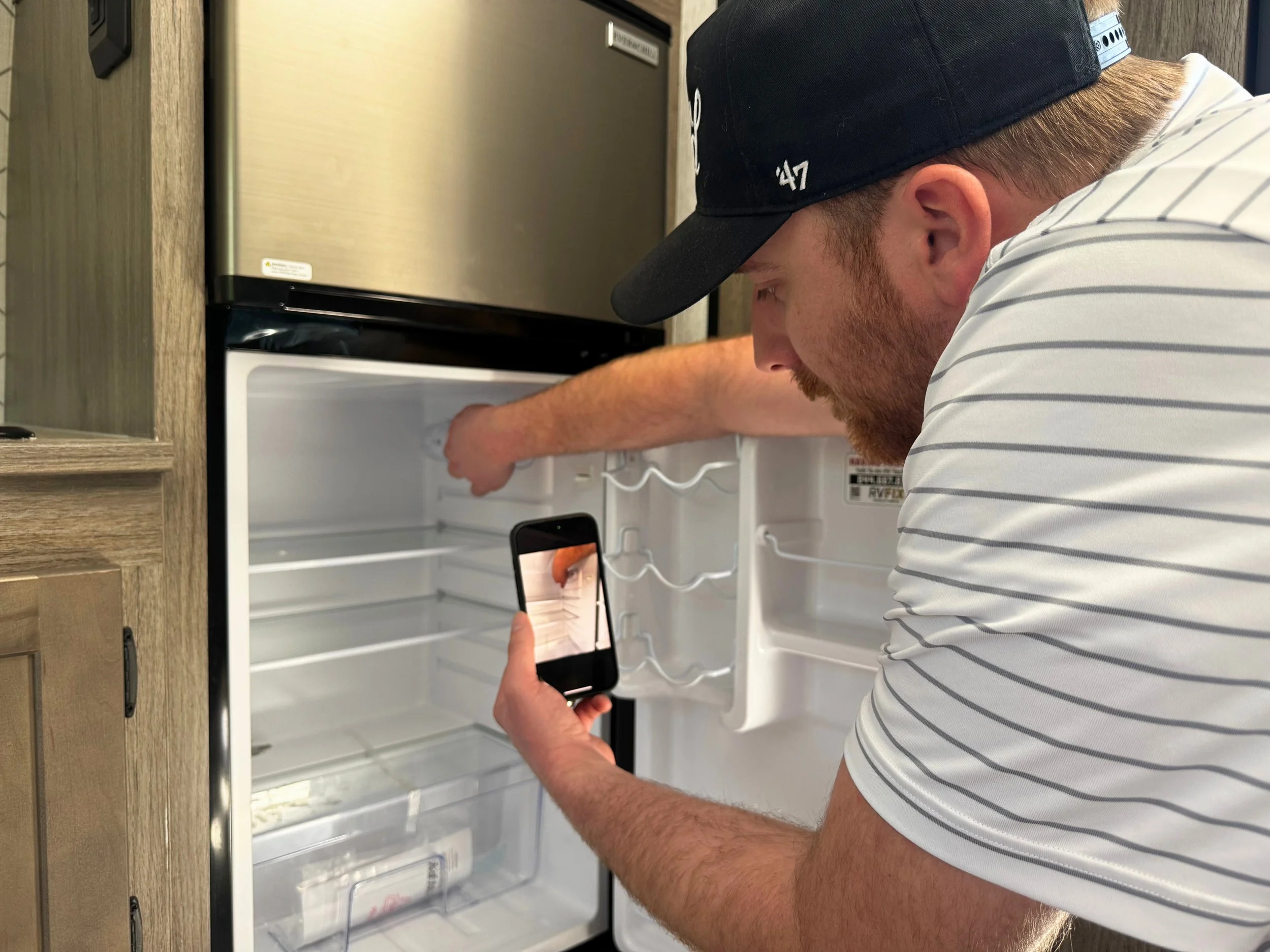 Troubleshooting an RV 12V Fridge over a video call with a Certified RV Tech through RVFix