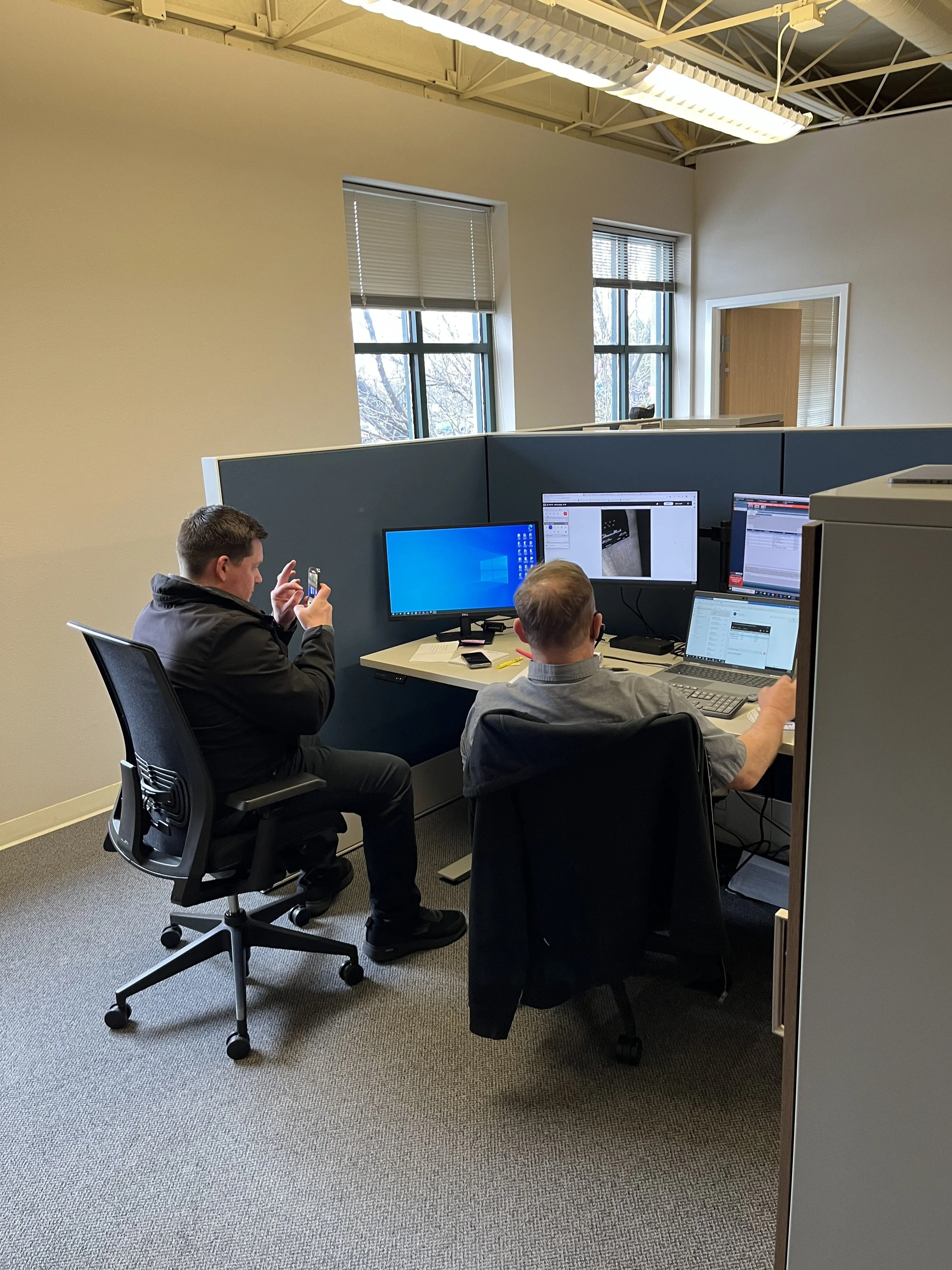 RVFix technicians performing a video call with an RVFix member