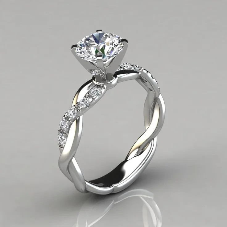 Moissanite Twist Round Cut Engagement Ring by Forever Moissanite.jpg