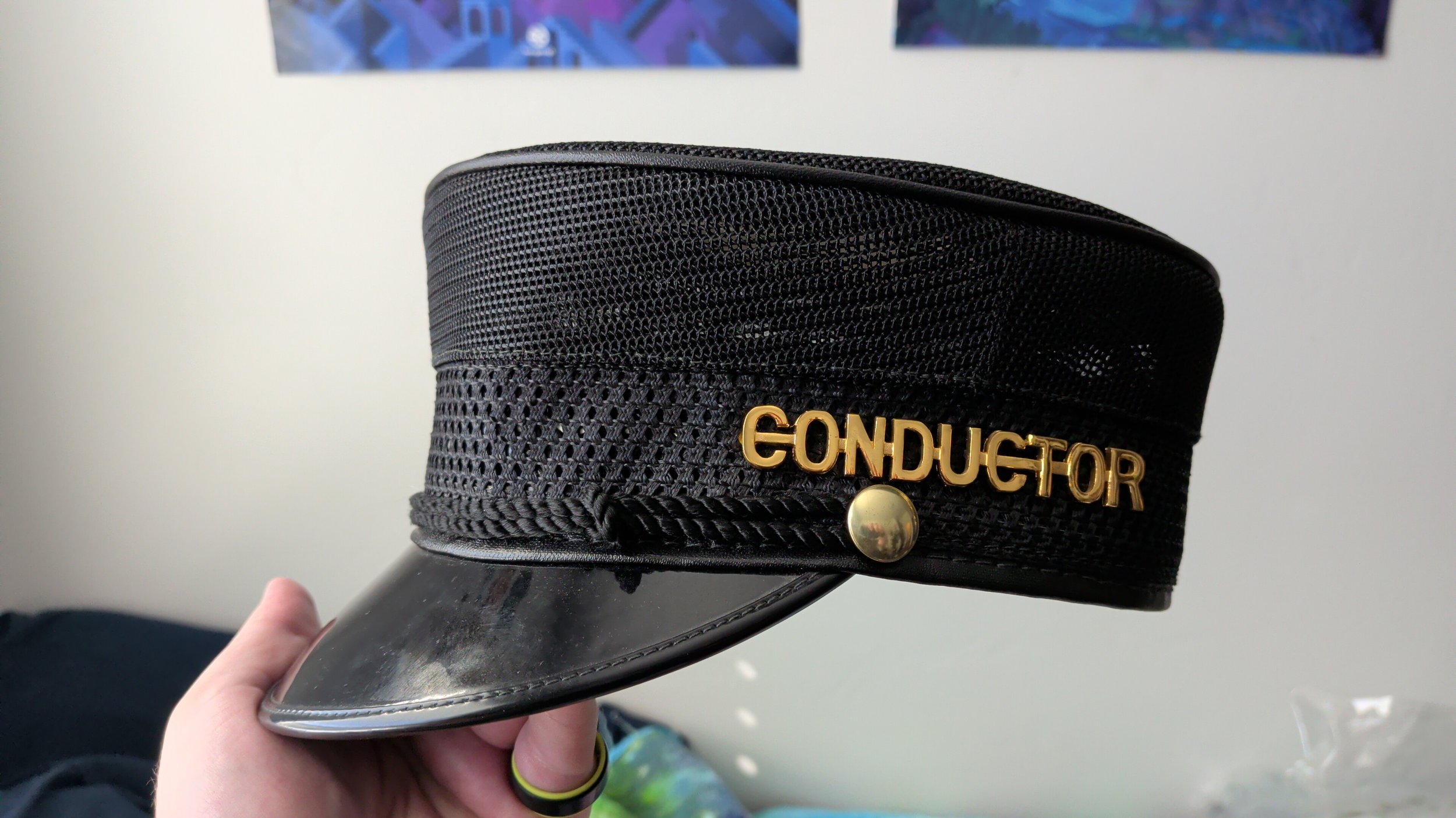 A genuine, Union made, Summer Conductor's hat from Chicago. This is my cap. I am so happy that I found it.