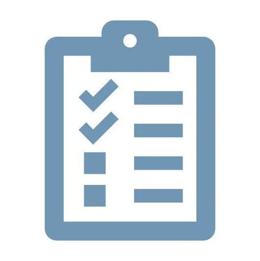 Modern building with large glass window, made of wood and metal, set against a mountainous landscape with grassy terrain in the foreground.