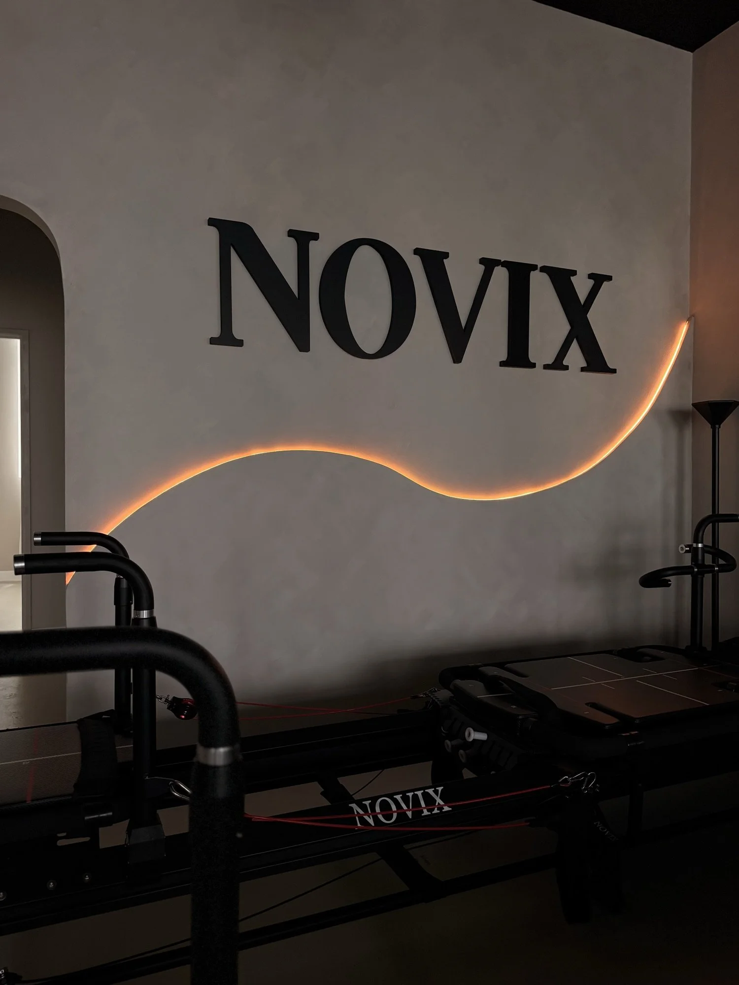 NOVIX Pilates sign and reformers at the studio in Rowland Heights, CA