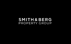 Smith & Berg Property Group logo on a black background