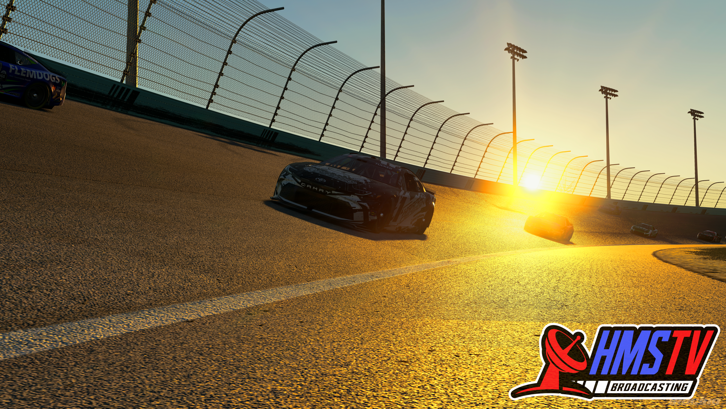 Race cars speeding on a dirt track during sunset with HMSTV Broadcasting logo in the bottom right corner.