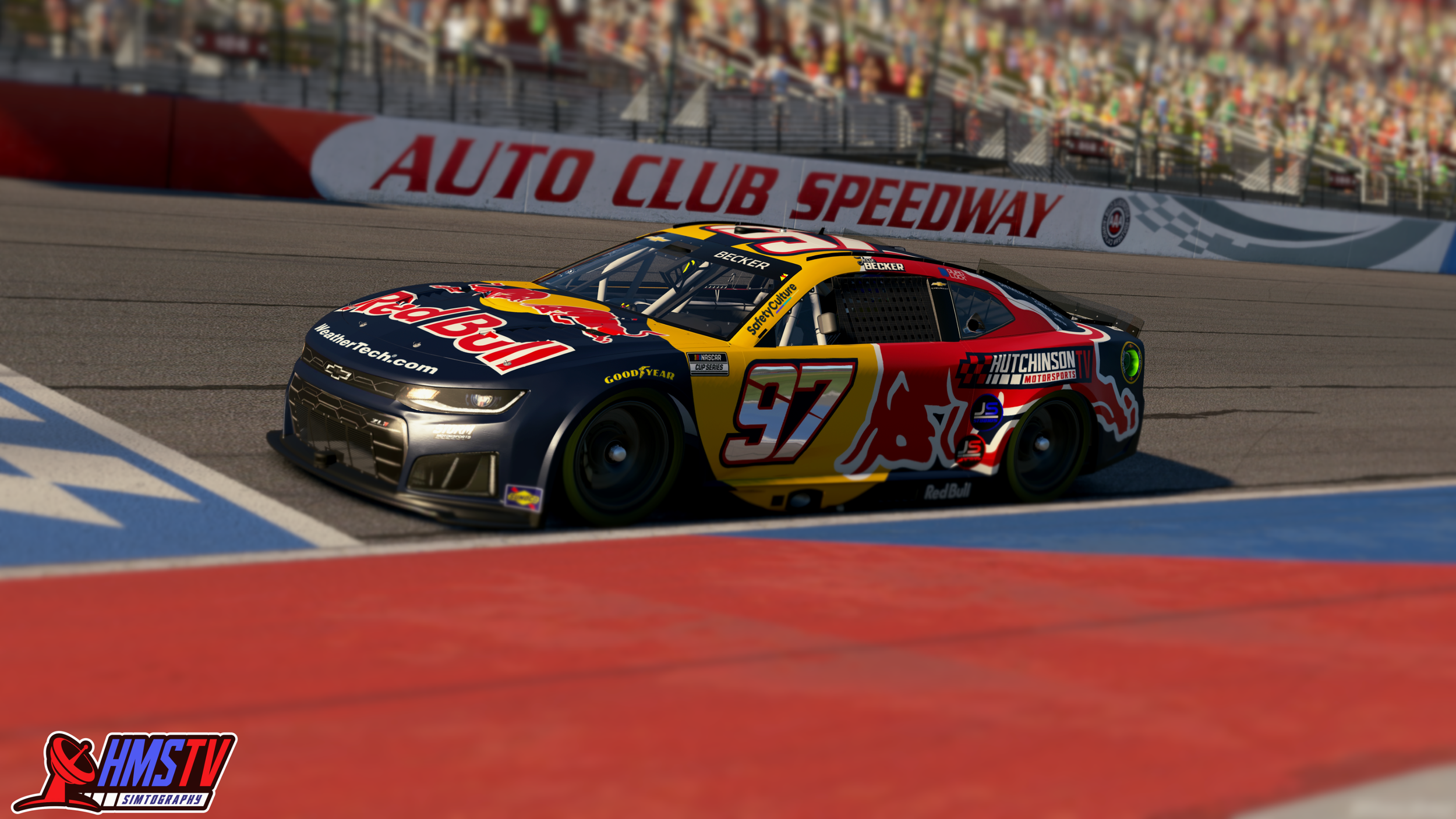A race car with a Red Bull sponsor logo, number 97, is on the racing track at Auto Club Speedway during a NASCAR event, with spectators watching from the stands in the background.
