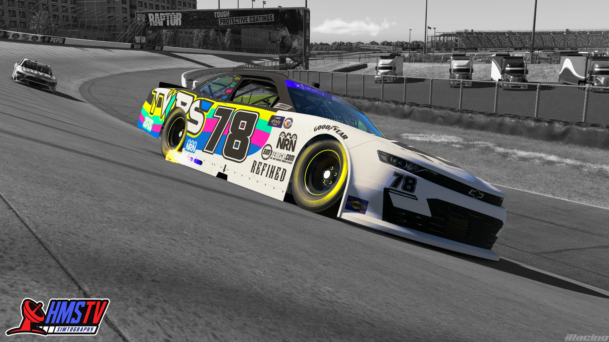 A race car on a racing track with a mix of saturated color and black-and-white background. The car is white with the number 18 and advertisements, sponsor logos, and bright accents. It is close to the ground, appearing to be in motion around a curve 