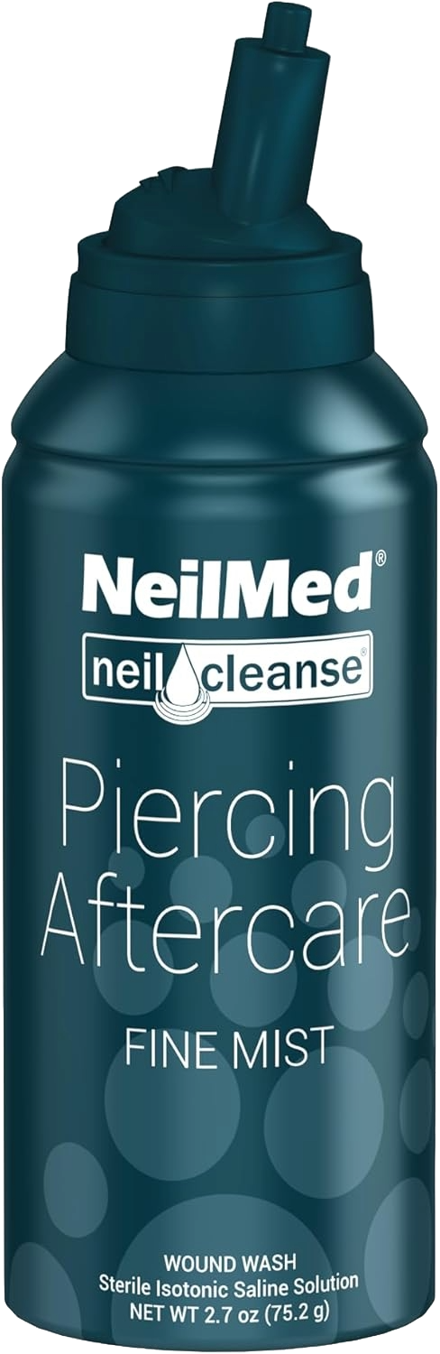 A spray bottle of NeilMed Piercing Aftercare Fine Mist, a sterile isotonic saline wound wash solution.