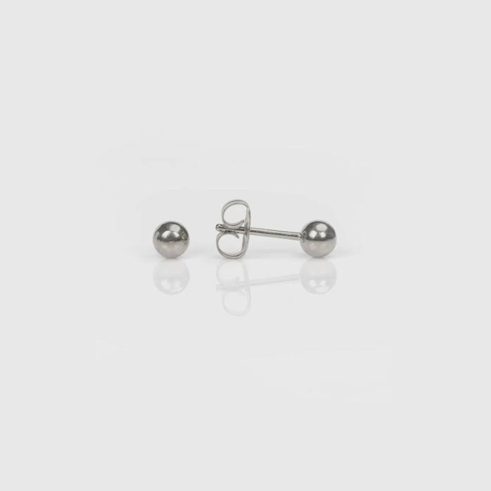 Silver stud earrings on a white background