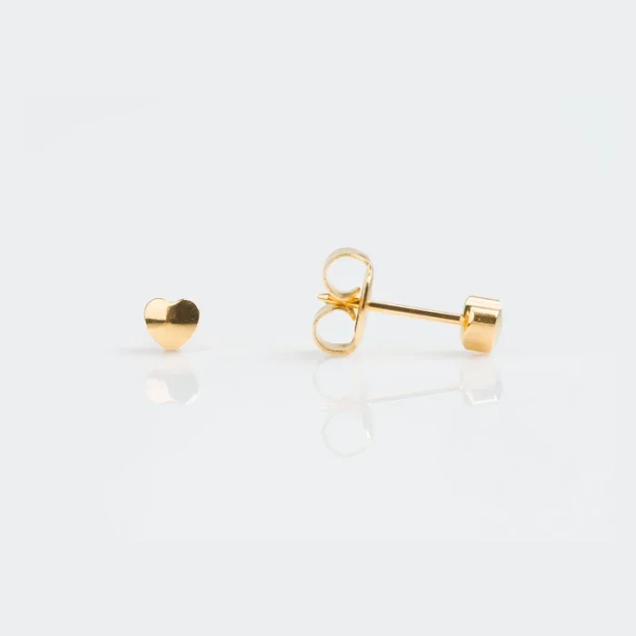 Gold heart-shaped stud earring and a gold earring post with backing on a white background.