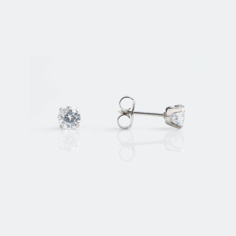 Pair of diamond stud earrings, one with the diamond facing forward and the other showing the back clasp.