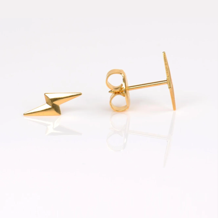 Gold lightning bolt-shaped stud earrings on a white background.