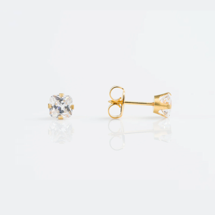 Gold stud earrings with clear gemstones.