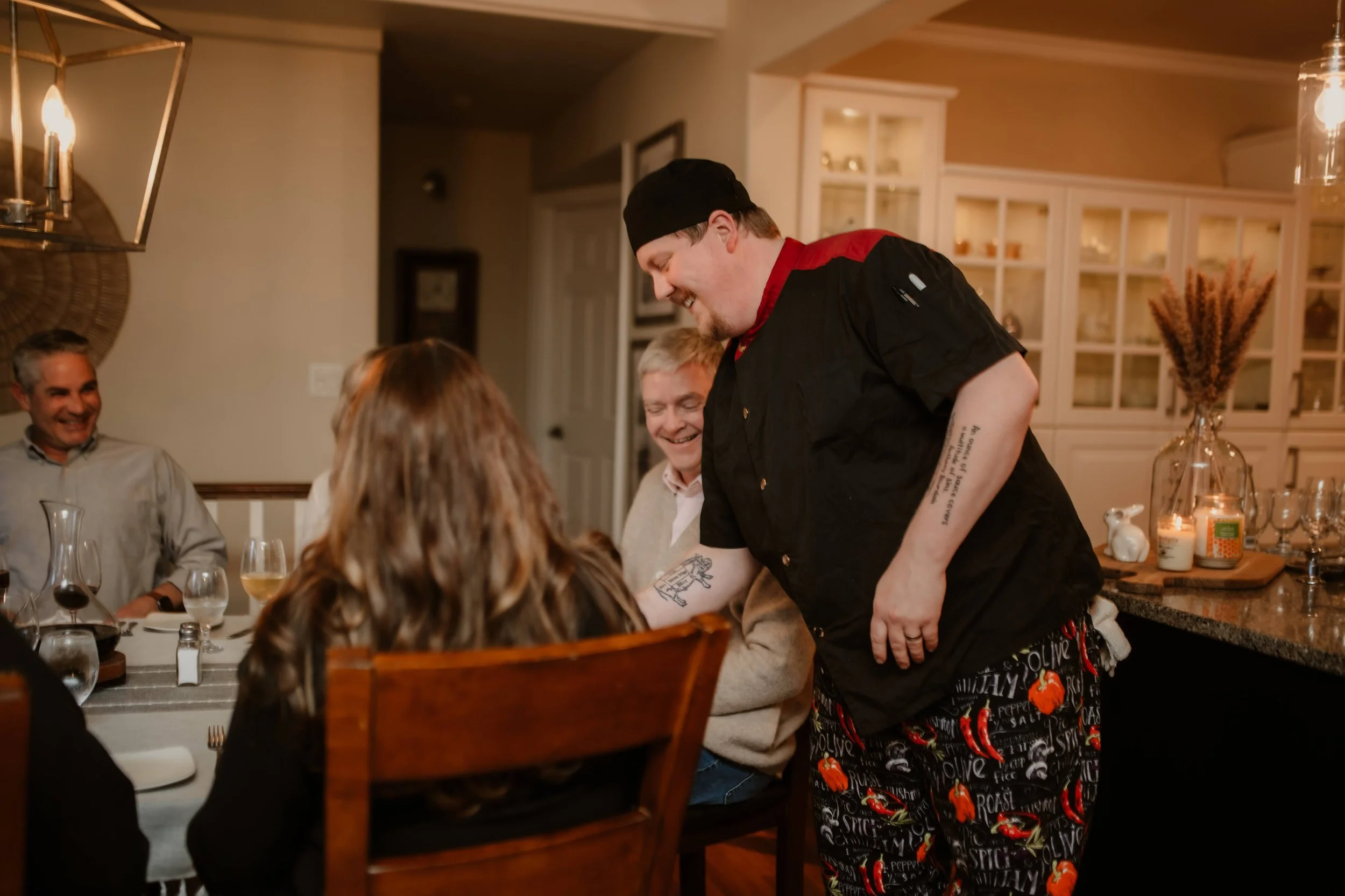 Chef Serving Guests.jpg