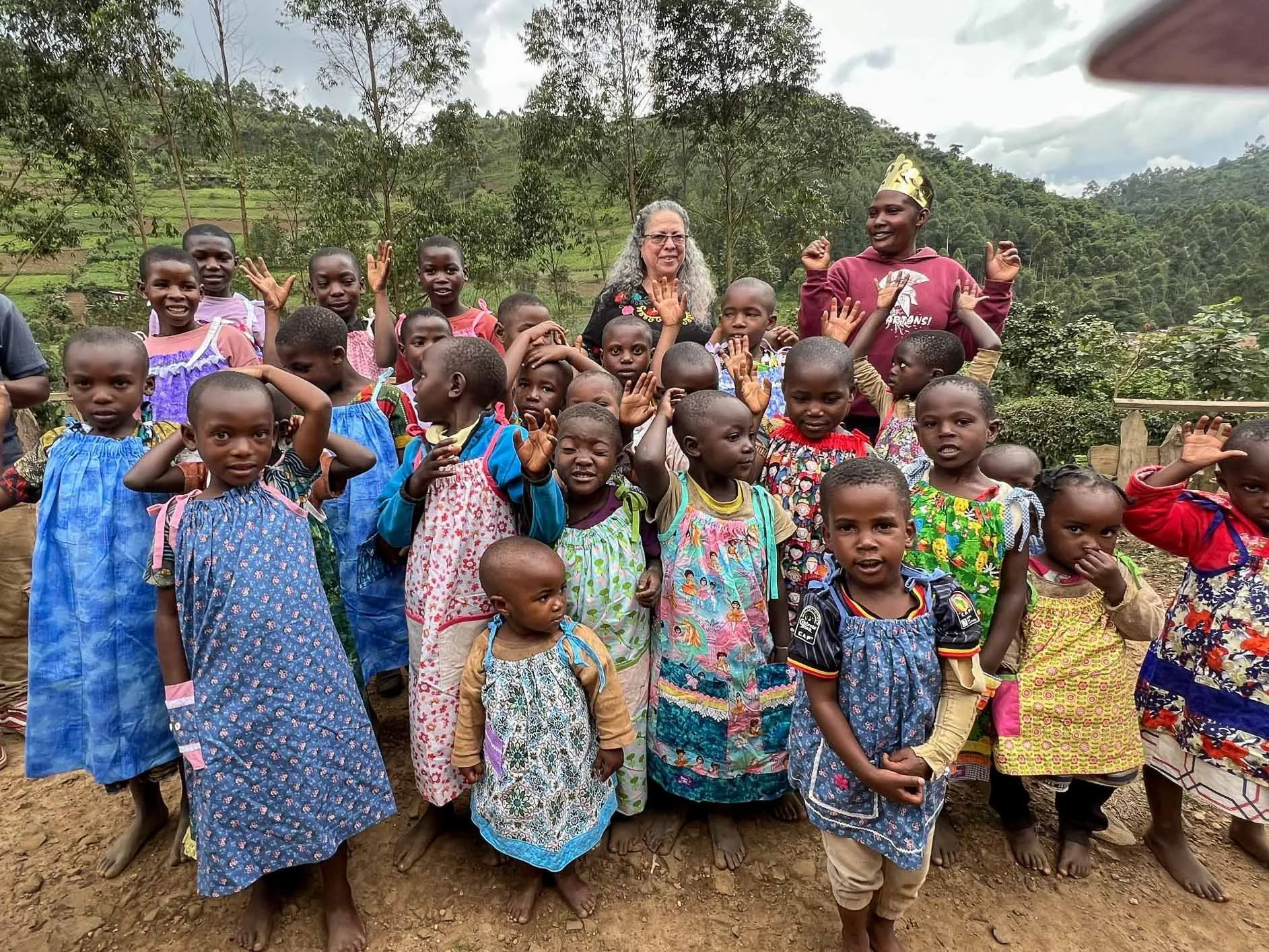 Bataw children dancing with Director, Gloria Cooper