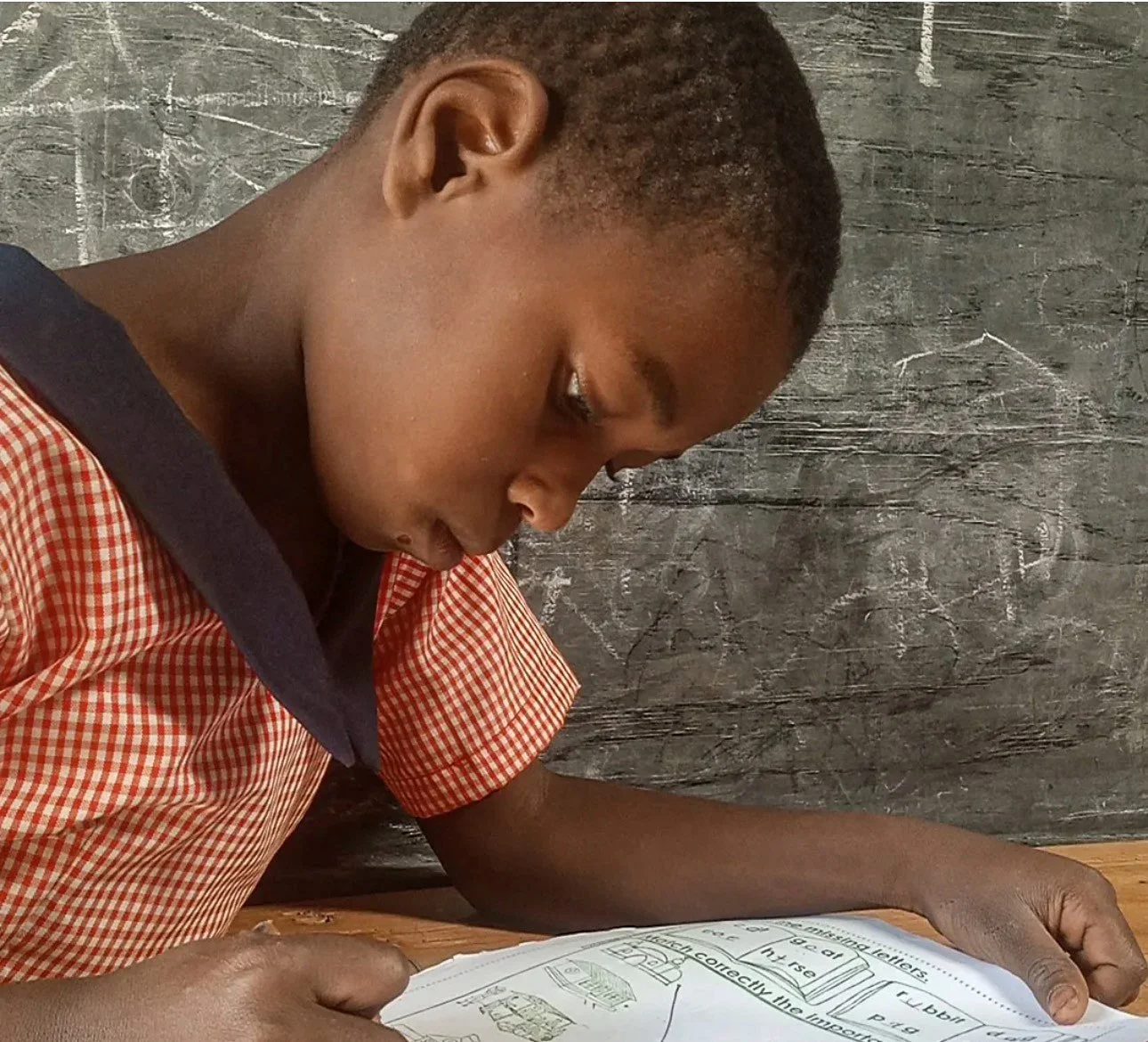 Batwa child at the Heart 2 Heart School supported by H2H Intl in Uganda