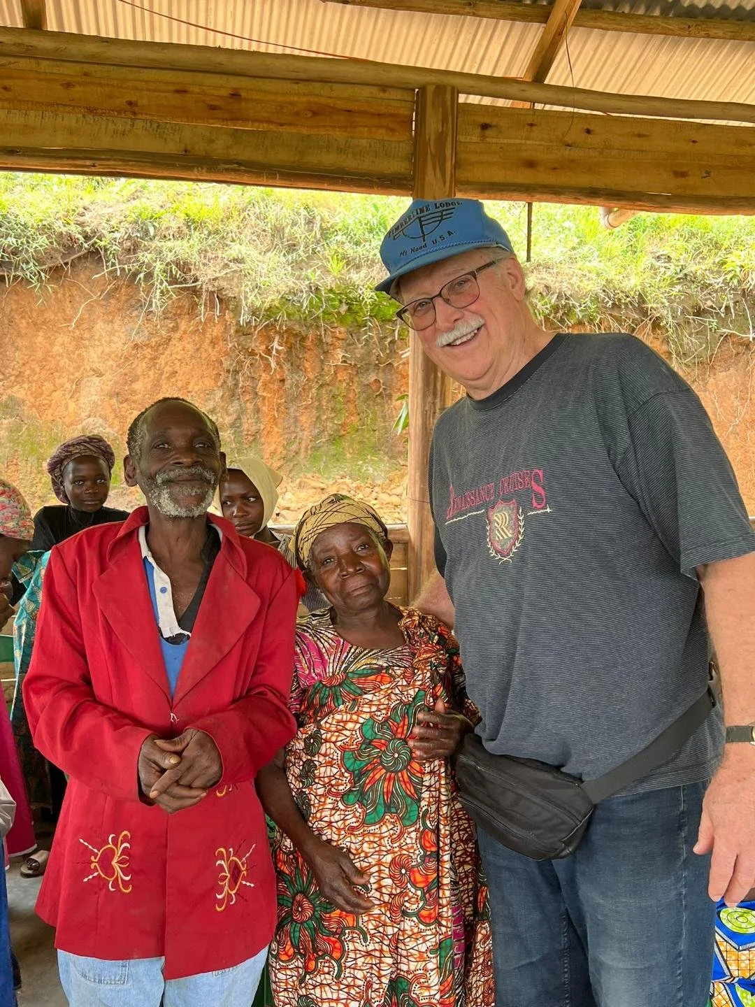 Bob Cooper with community members of the Batwa people of Uganda, Africa