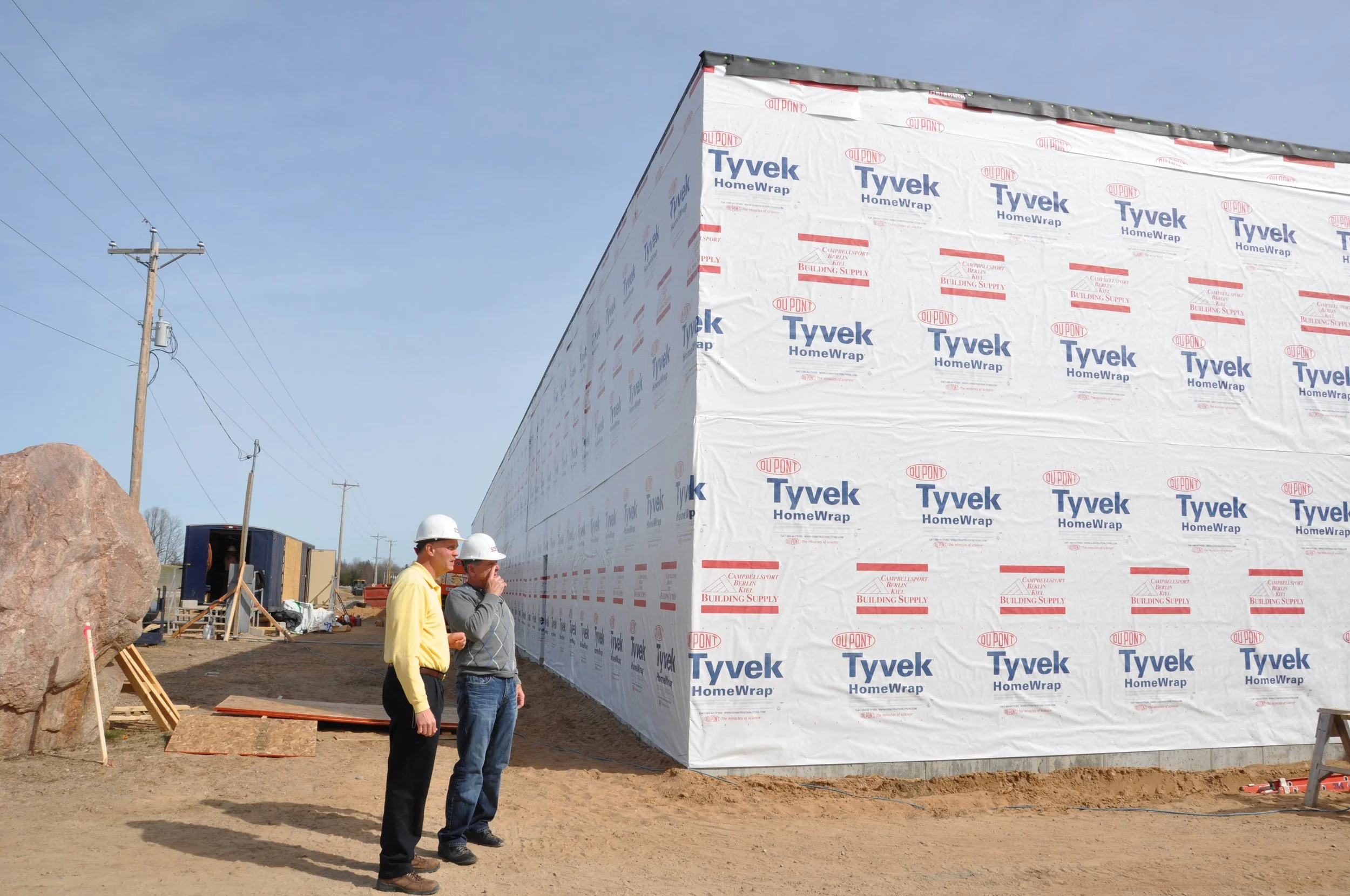 Mark Burgess and Brad McKay looking at the new Top Brass wipes manufacturing building