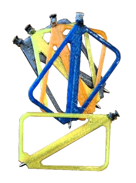 Colorful bike pedal cages in blue, yellow, orange, and green stacked together.
