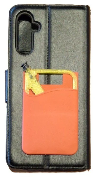 A phone case with a small orange aerosol can and a yellow spray nozzle inserted into it.