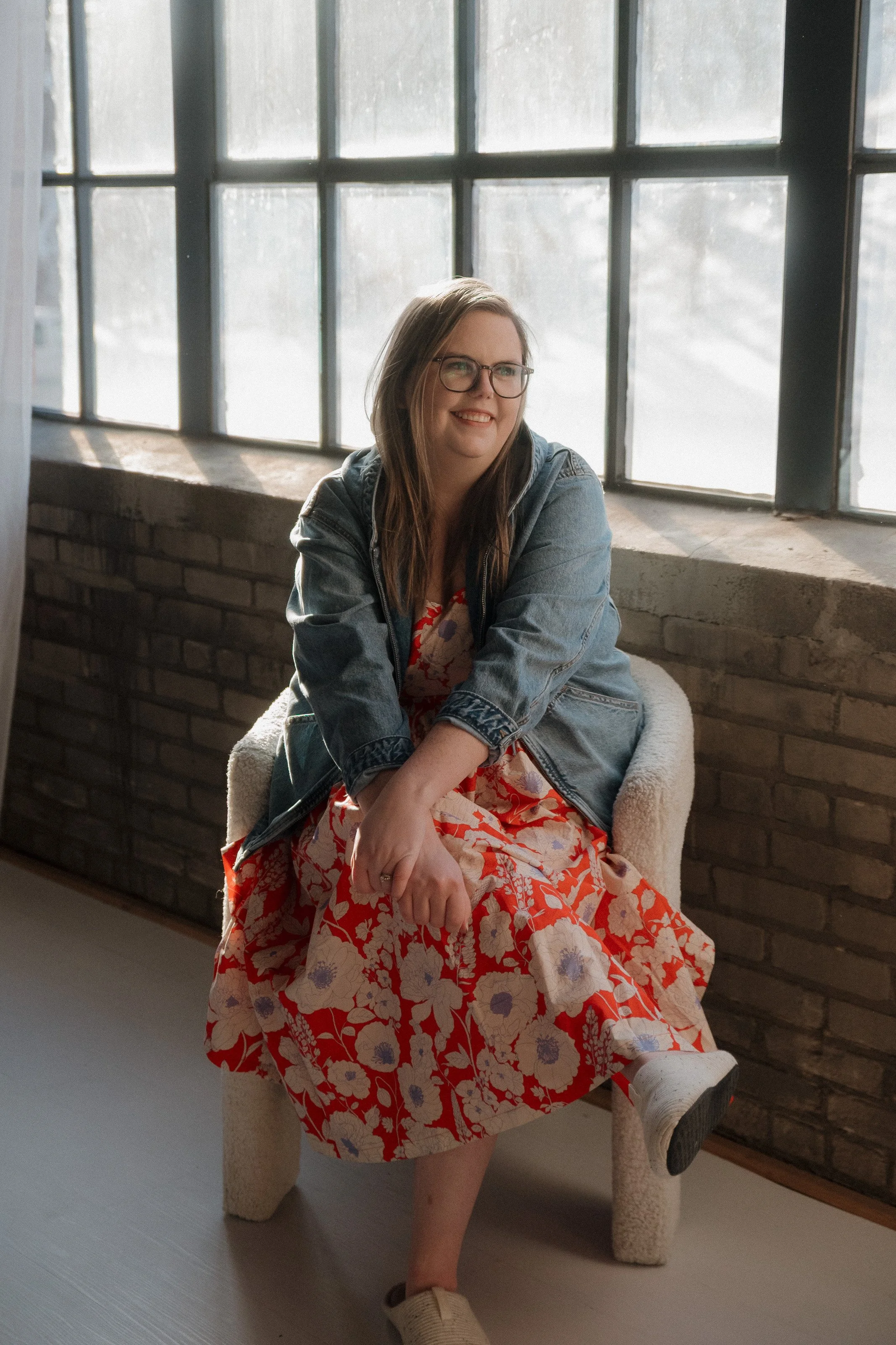 woman sitting on chair smiling