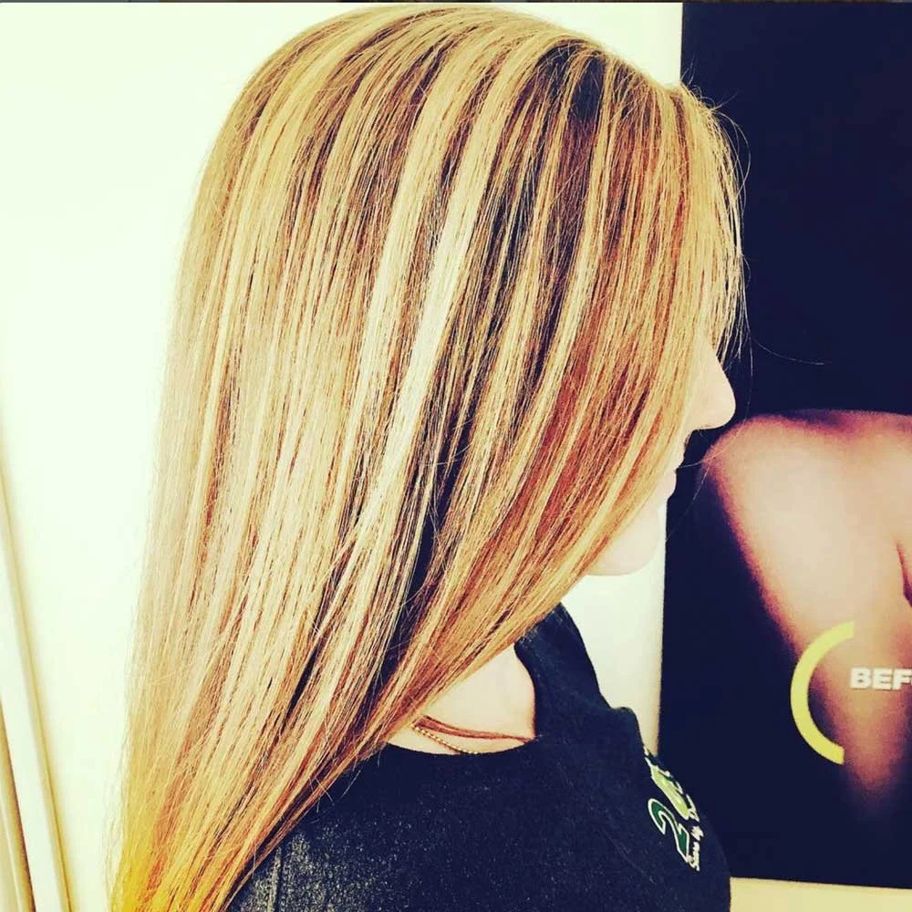 Beautiful sun-kissed Balayage highlights ...from brown to blonde in one visit!!