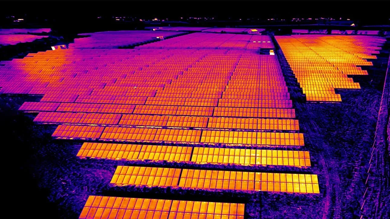 Thermal drone imaging of solar panel installation detecting heat variations