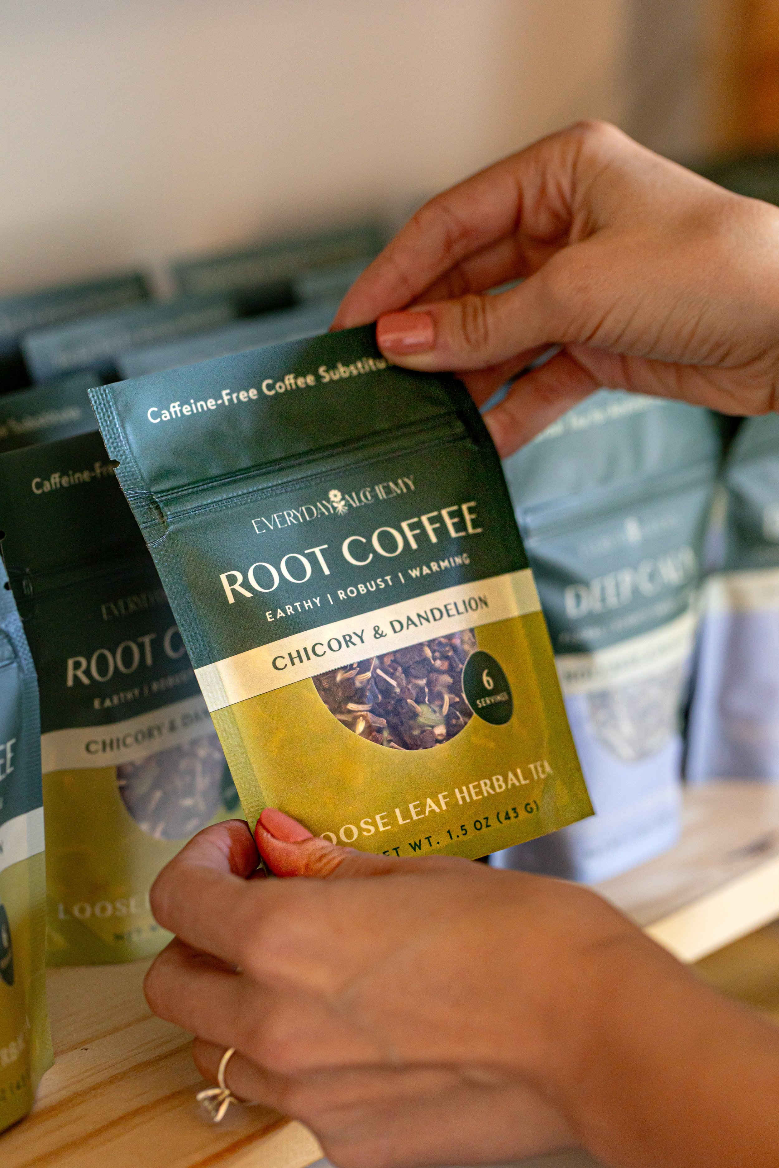 hands-holding-small-bag-root-coffee
