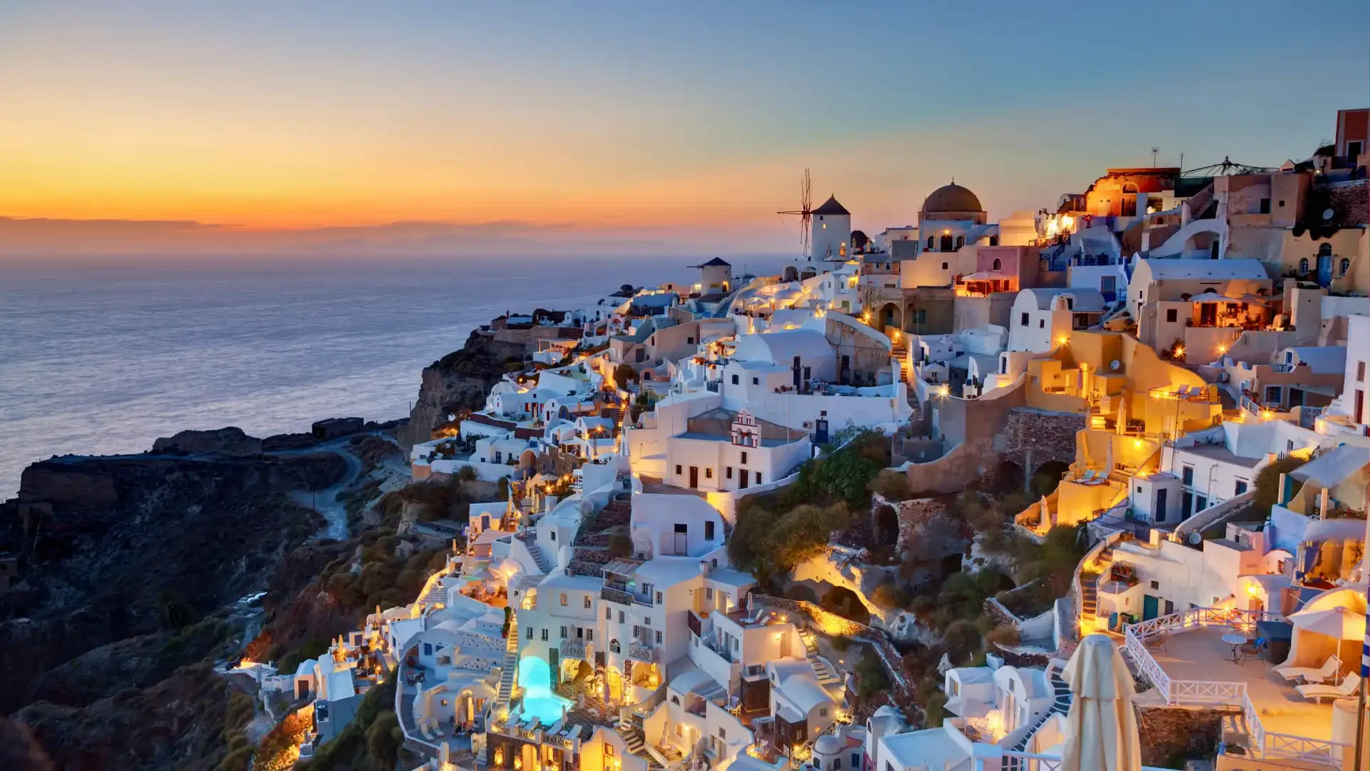 royal-caribbean-mediterranean-cruise-santorini-greece-sunset.webp