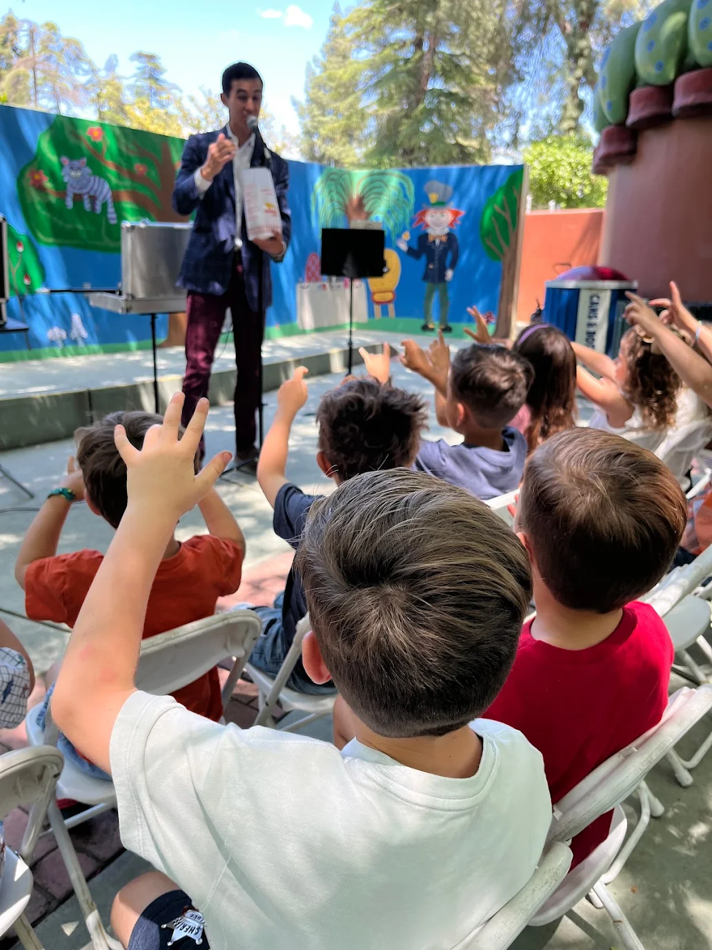 magician performing at kids birthday party