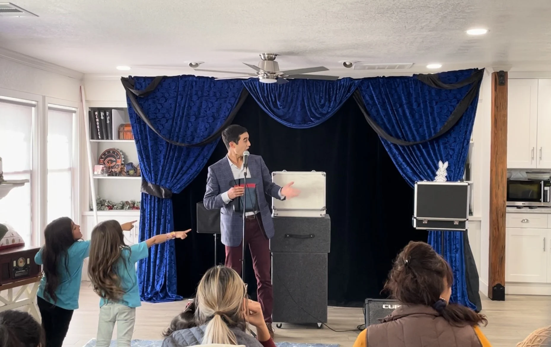 Magician performing at birthday party