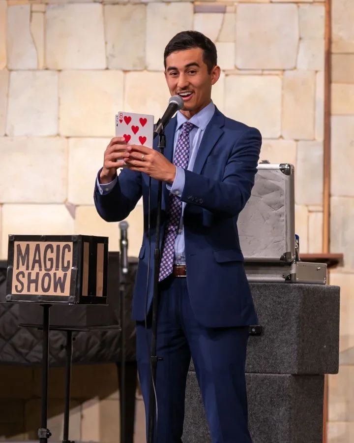 Brady Lee performing magic show