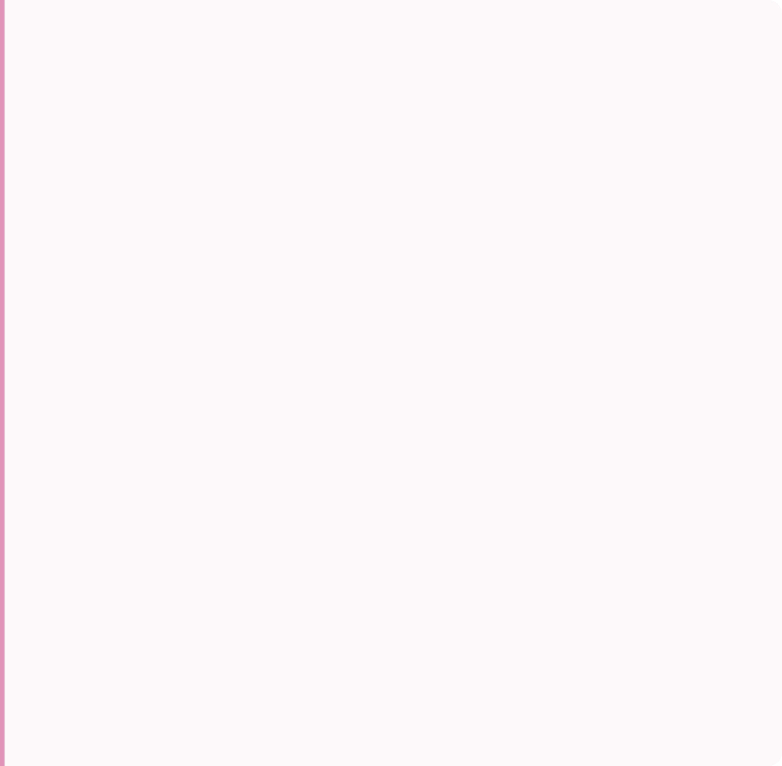 A solid pink background with no objects or features.